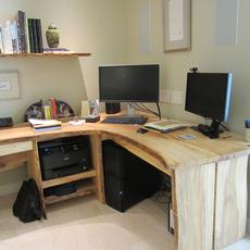 Elm Desk - Live edge Elm wrap around desk with 2 single board tops. Four sequential matched drawer fronts. Inlaid Wenge butterfly joints. Matching floating shelf from same tree.